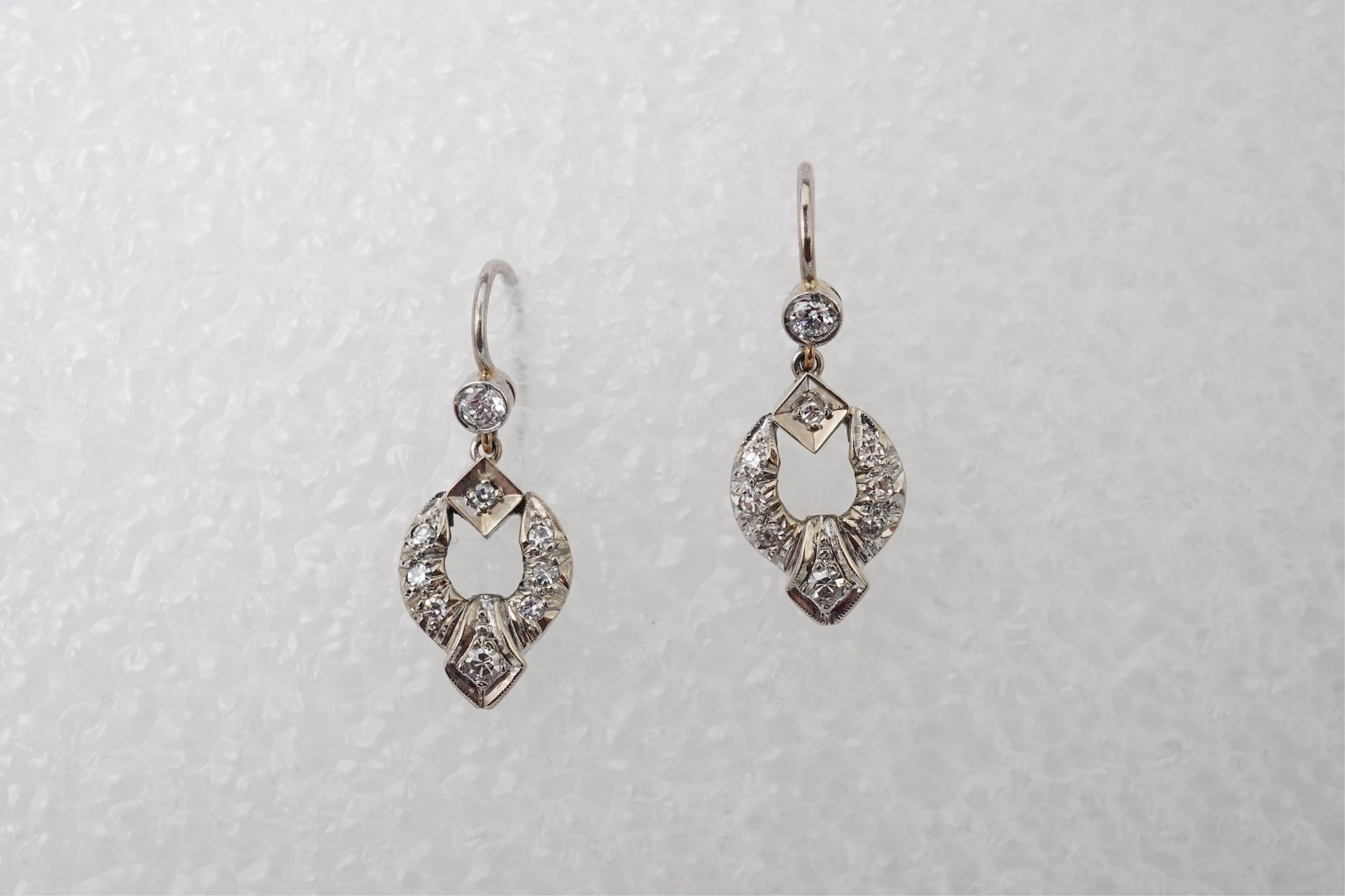 A pair of diamond earrings, mid 20th century and later